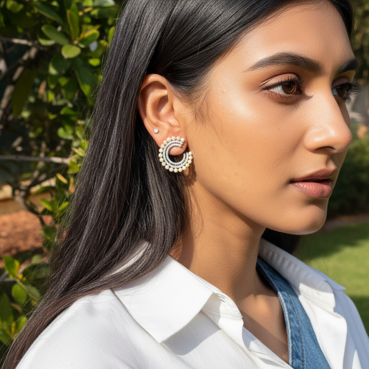 Woman wearing earrings with a natural background