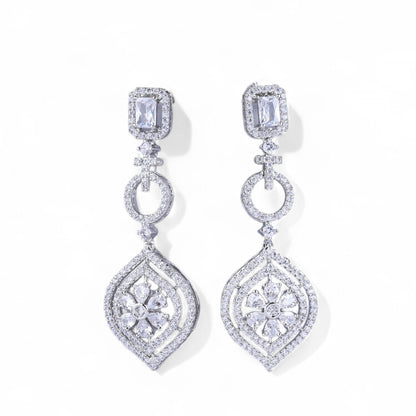 Pair of diamond earrings on a white background