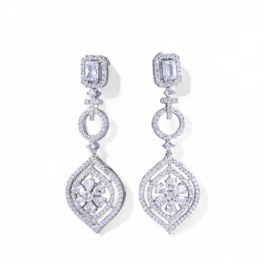 Pair of diamond earrings on a white background
