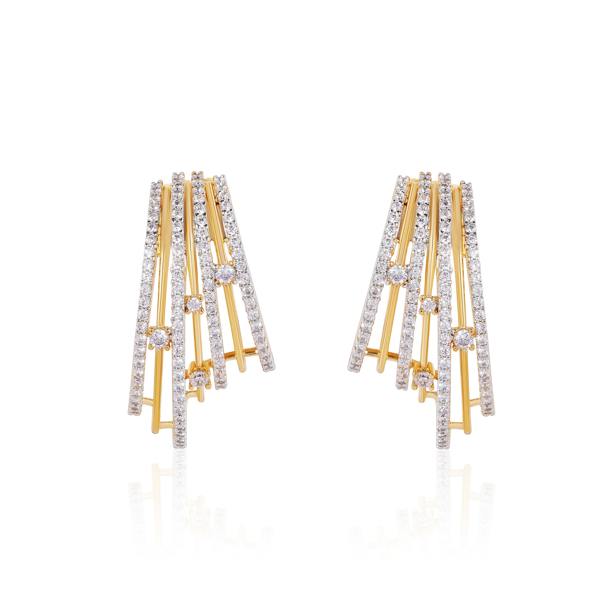 Gold and diamond earrings on a white background