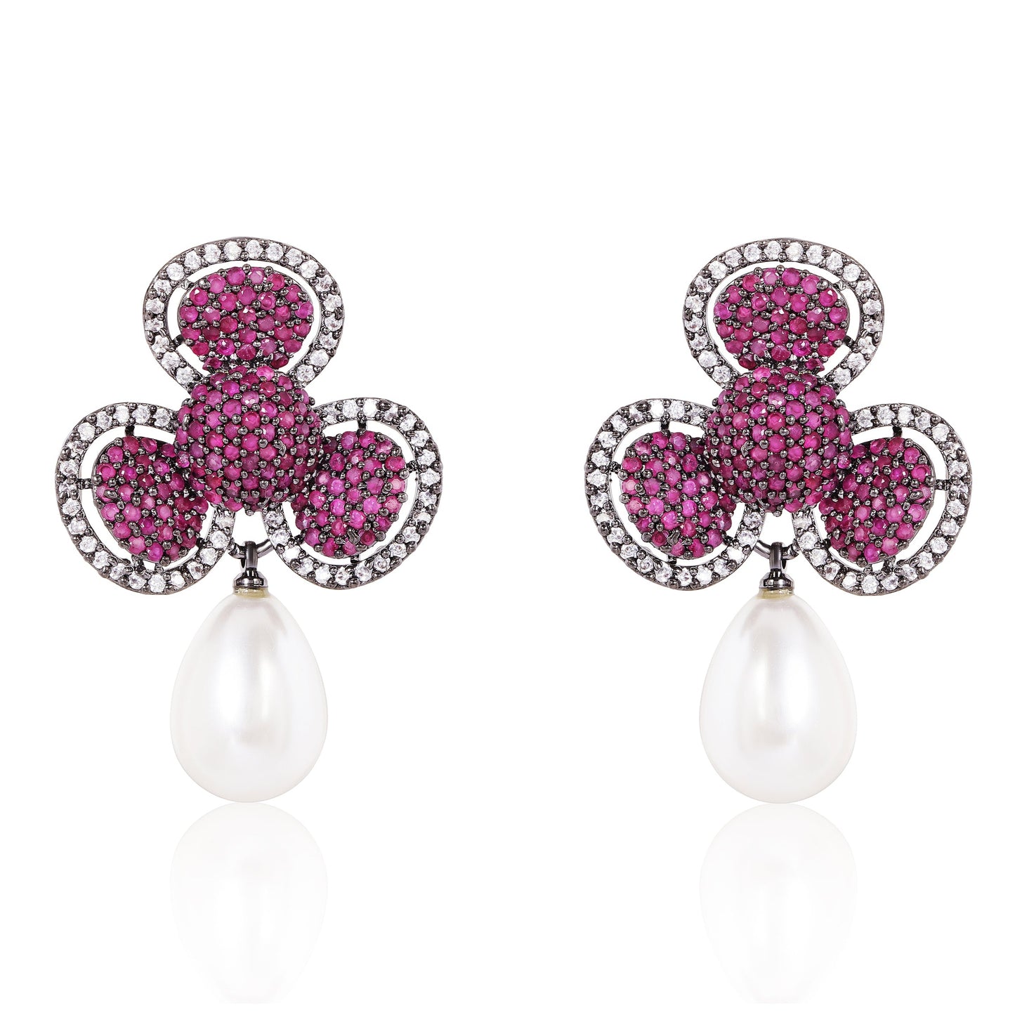 Pair of earrings with pink gemstones and pearl drops on a white background