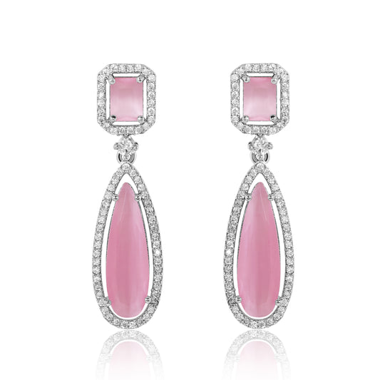 Pair of pink teardrop earrings with silver accents on a white background
