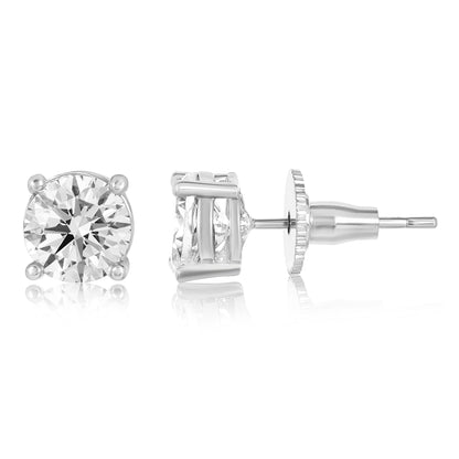 Pair of diamond stud earrings on a white background