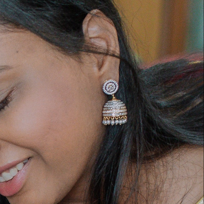 Group of women in traditional attire participating in a ritual or celebration.