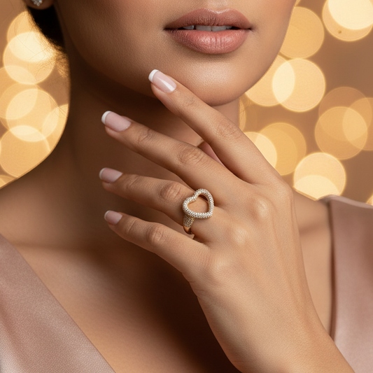 Woman wearing a heart-shaped ring with a blurred bokeh background