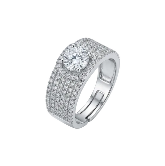 Silver ring with a large central gemstone and smaller stones on a white background