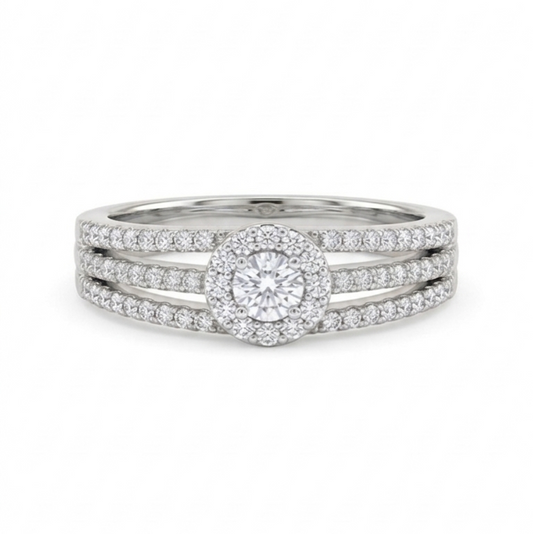 Silver ring with multiple diamond settings on a white background