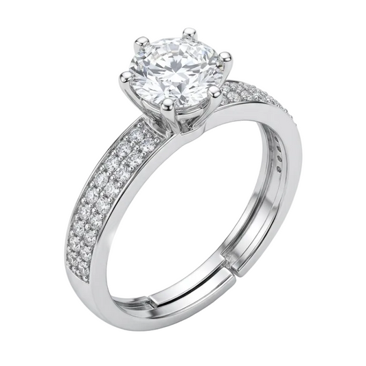 Silver ring with a diamond on a white background