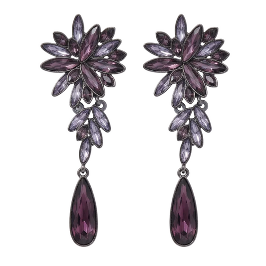 Purple floral earrings with teardrop accents on a white background