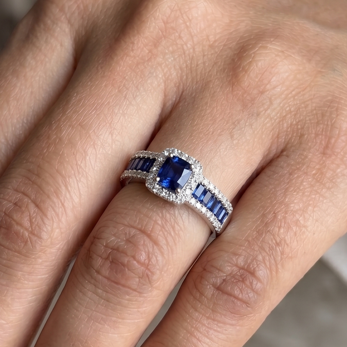 Blue Emerald cut stones and Diamond Ring