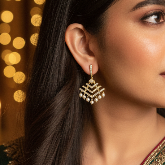Woman wearing traditional earrings with a blurred bokeh background