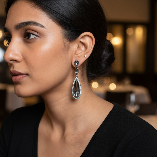 Woman wearing earrings in a restaurant setting