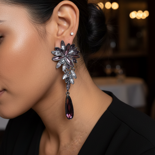 Close-up of a woman wearing a sparkling earring with a blurred background