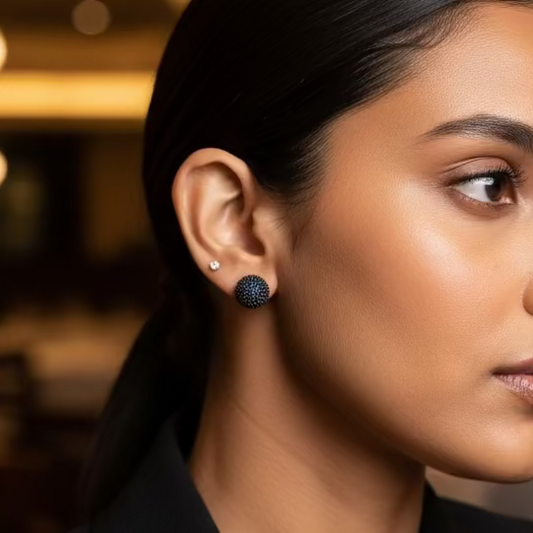 Close-up of a person wearing a white t-shirt with a neutral background