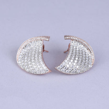 Pair of ornate earrings with pearls 