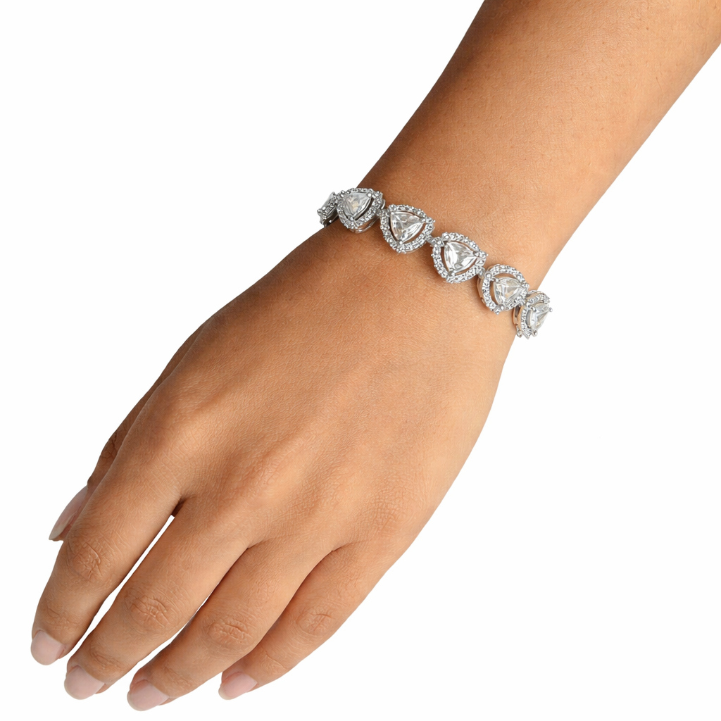 Elegant bracelet on a wrist against a white background