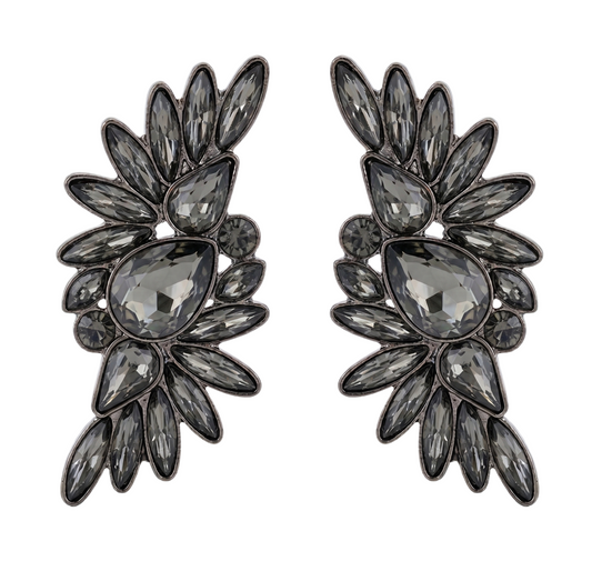 Pair of black floral earrings with clear gemstones on a white background