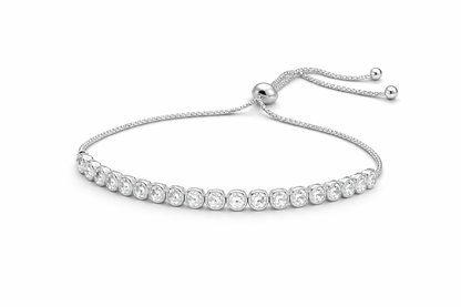 Silver bracelet with clear stones on a white background