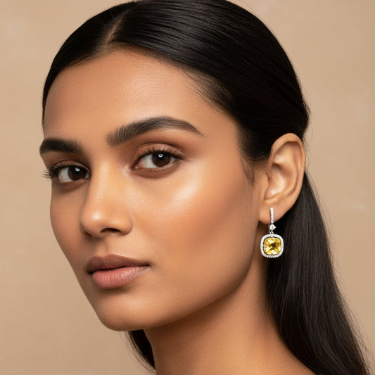 Woman wearing a beige top with a neutral background